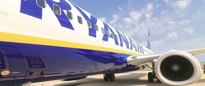 UK companies rein in spending and hiring; Ryanair reports further losses; Nissan funding in question.